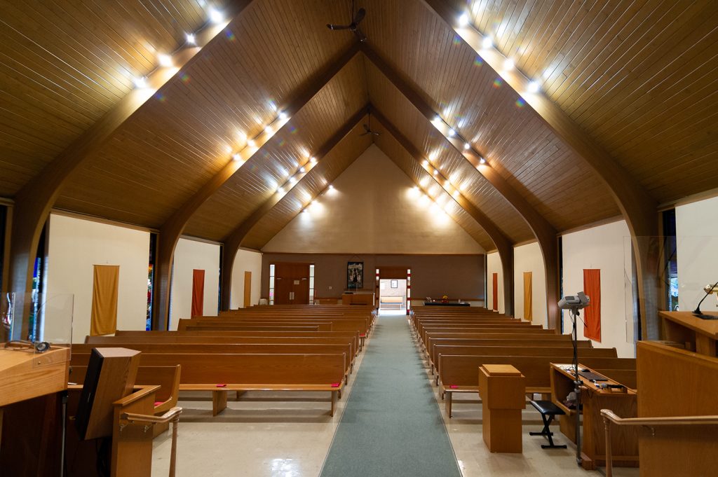 Inside of church showing pews